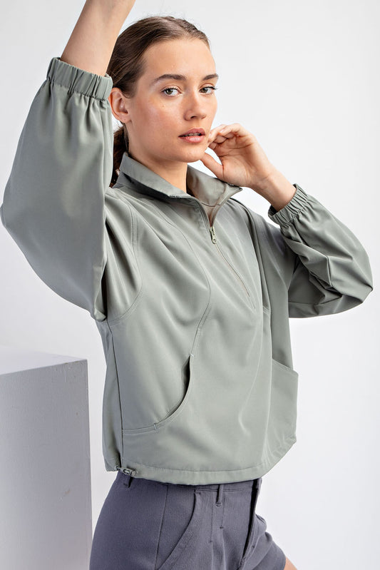 STRETCH QUARTER ZIP TOP