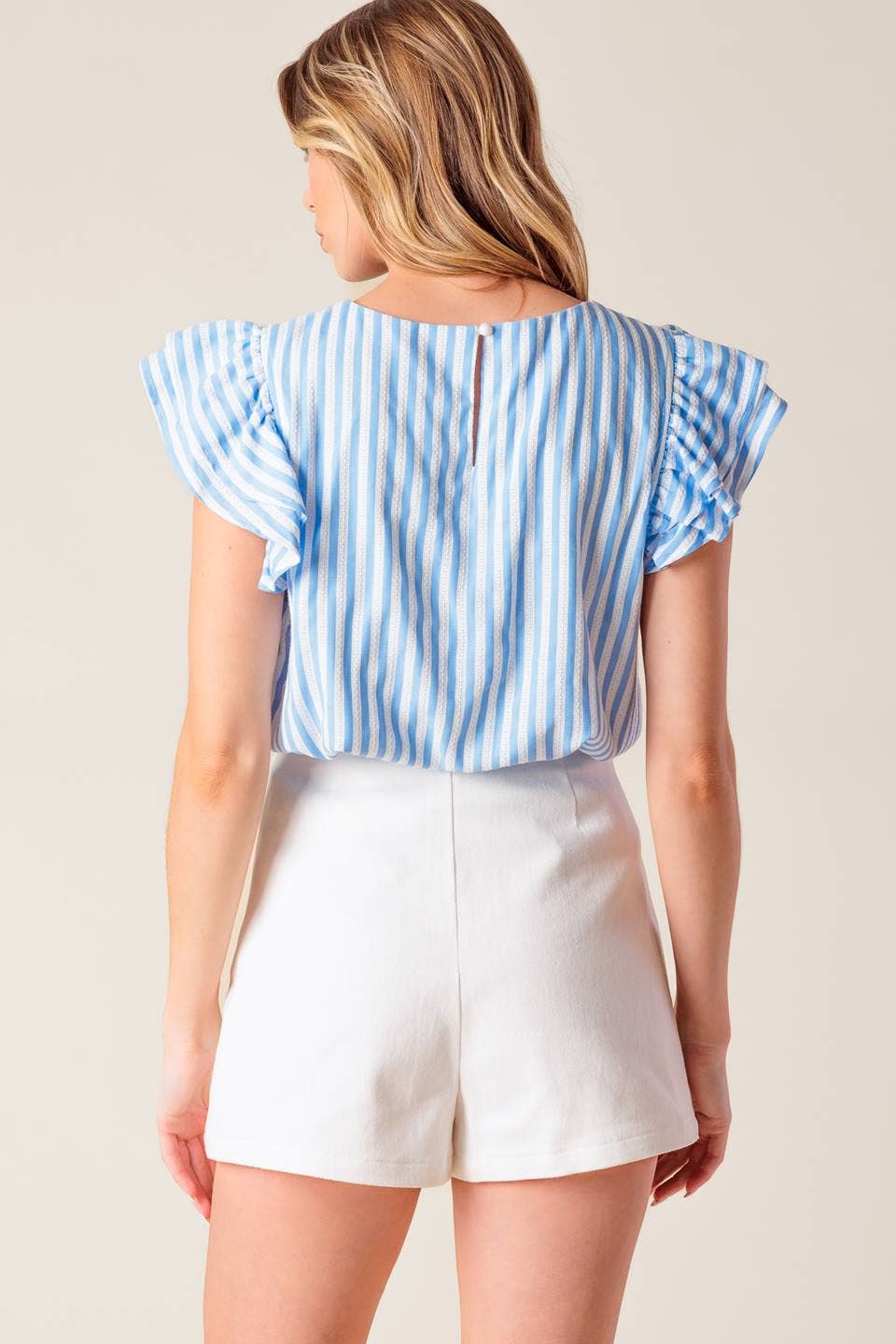 A solid woven skort - The Season Boutique