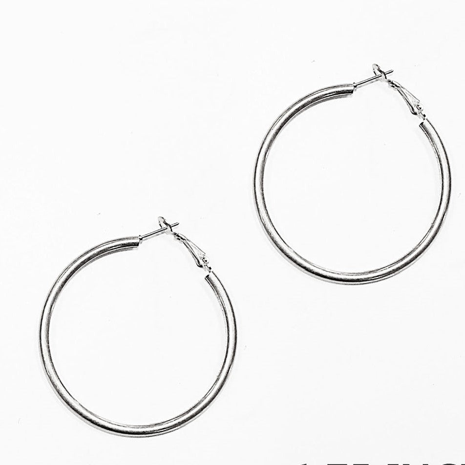 Worn Silver Hoop Earing