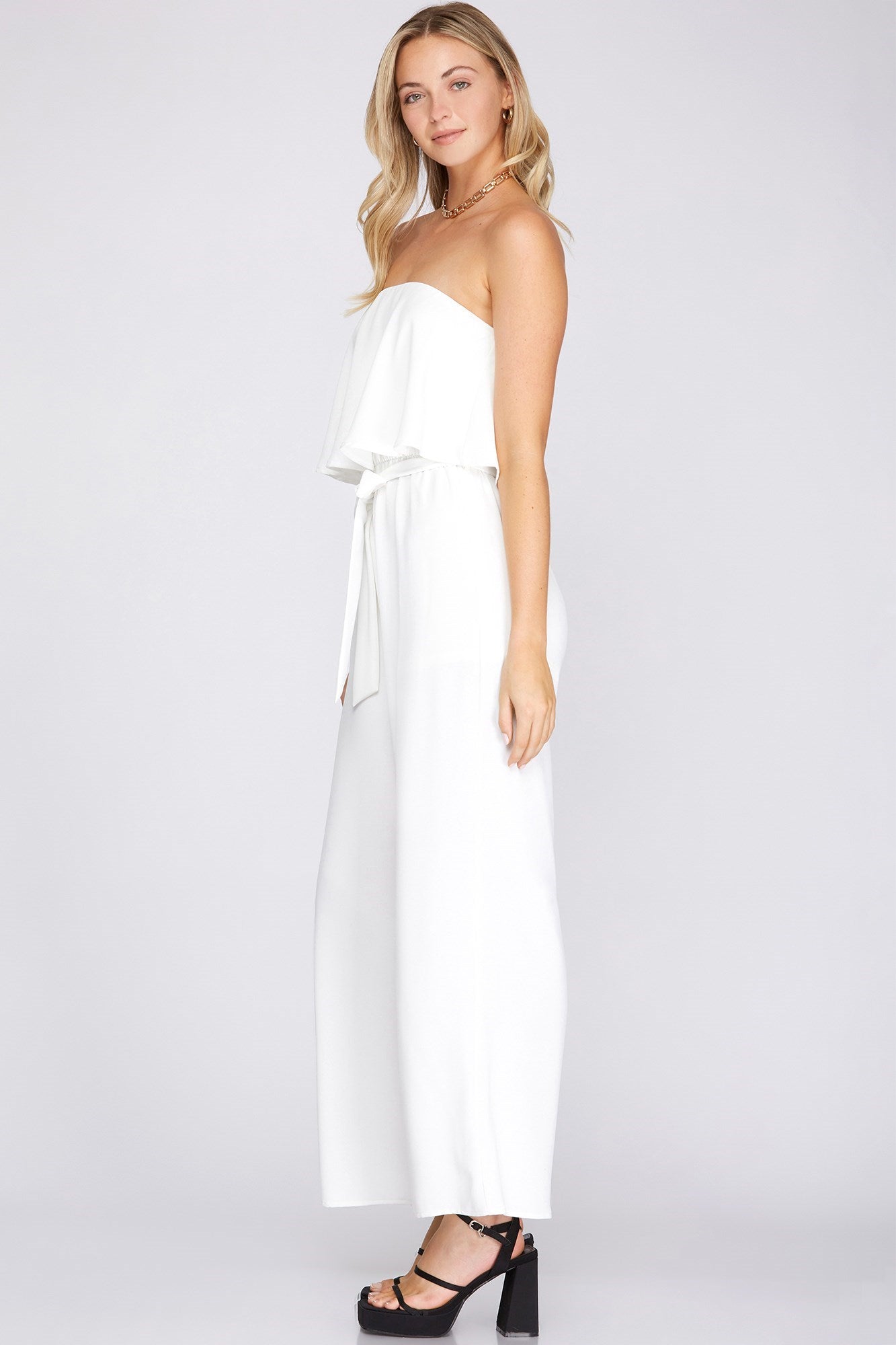 STRAPLESS RUFFLE TOP WOVEN JUMPSUIT WITH WAIST SASH - The Season Boutique