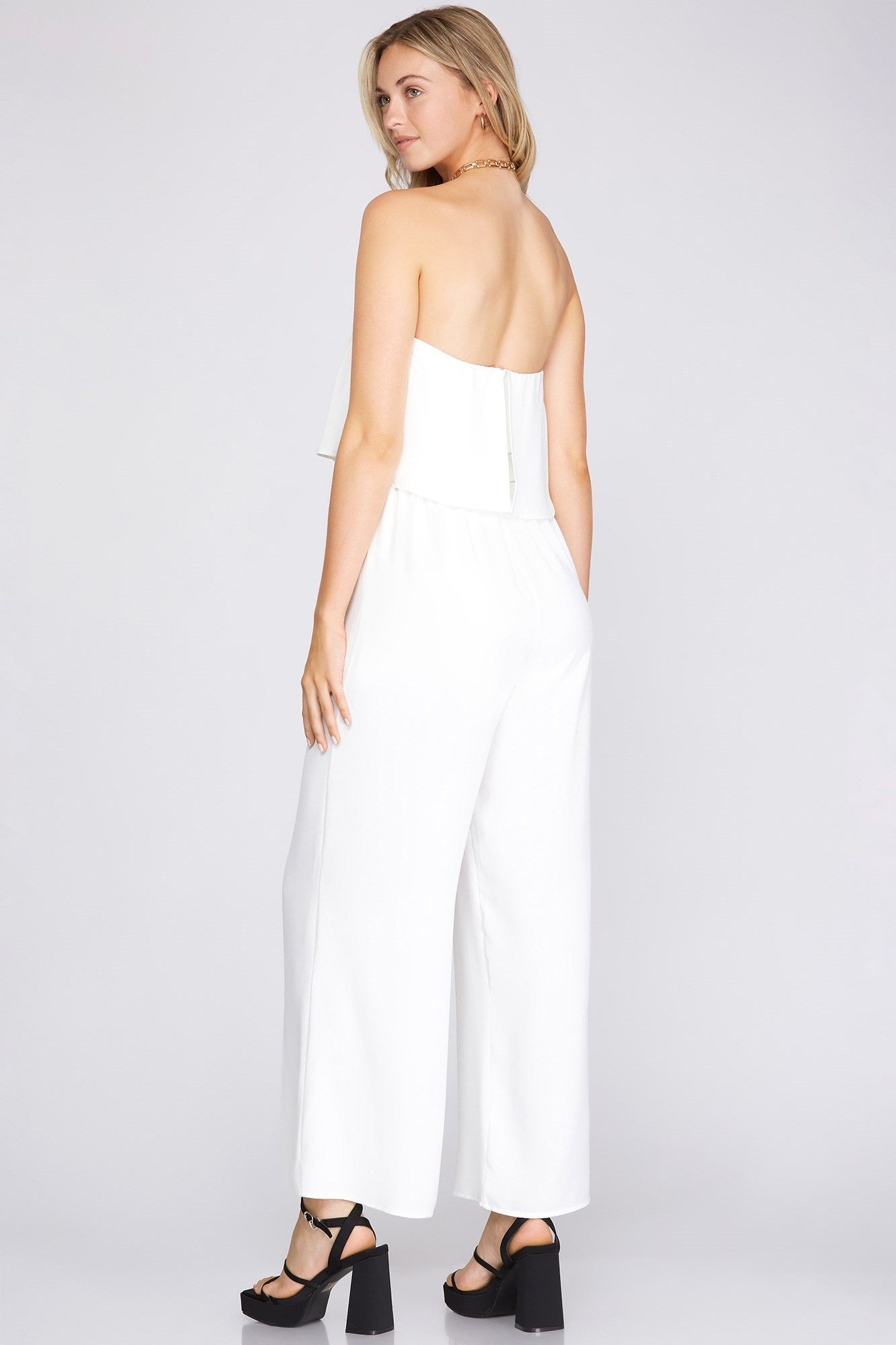 STRAPLESS RUFFLE TOP WOVEN JUMPSUIT WITH WAIST SASH - The Season Boutique